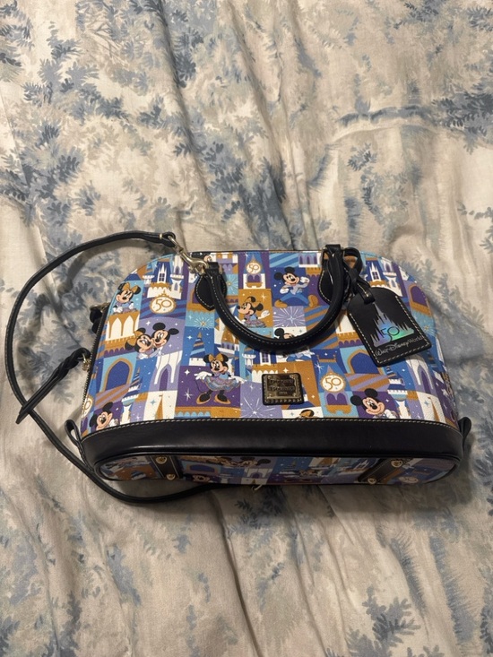 Dooney & Bourke Handbags - Dooney & Bourke Blue Multi Disney 50th Castle Print Satchel with Black Trim